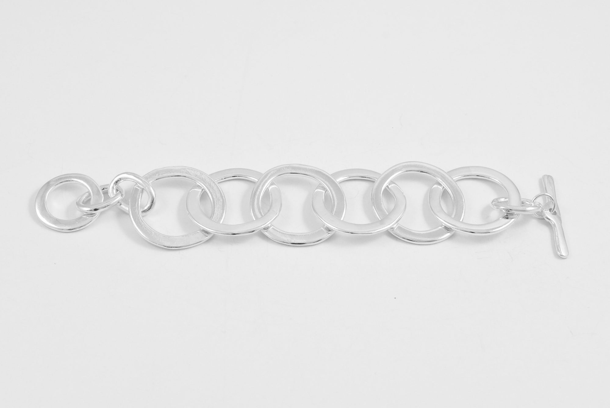 The Elizabeth Bracelet features 6 large round sterling silver links with a statement toggle