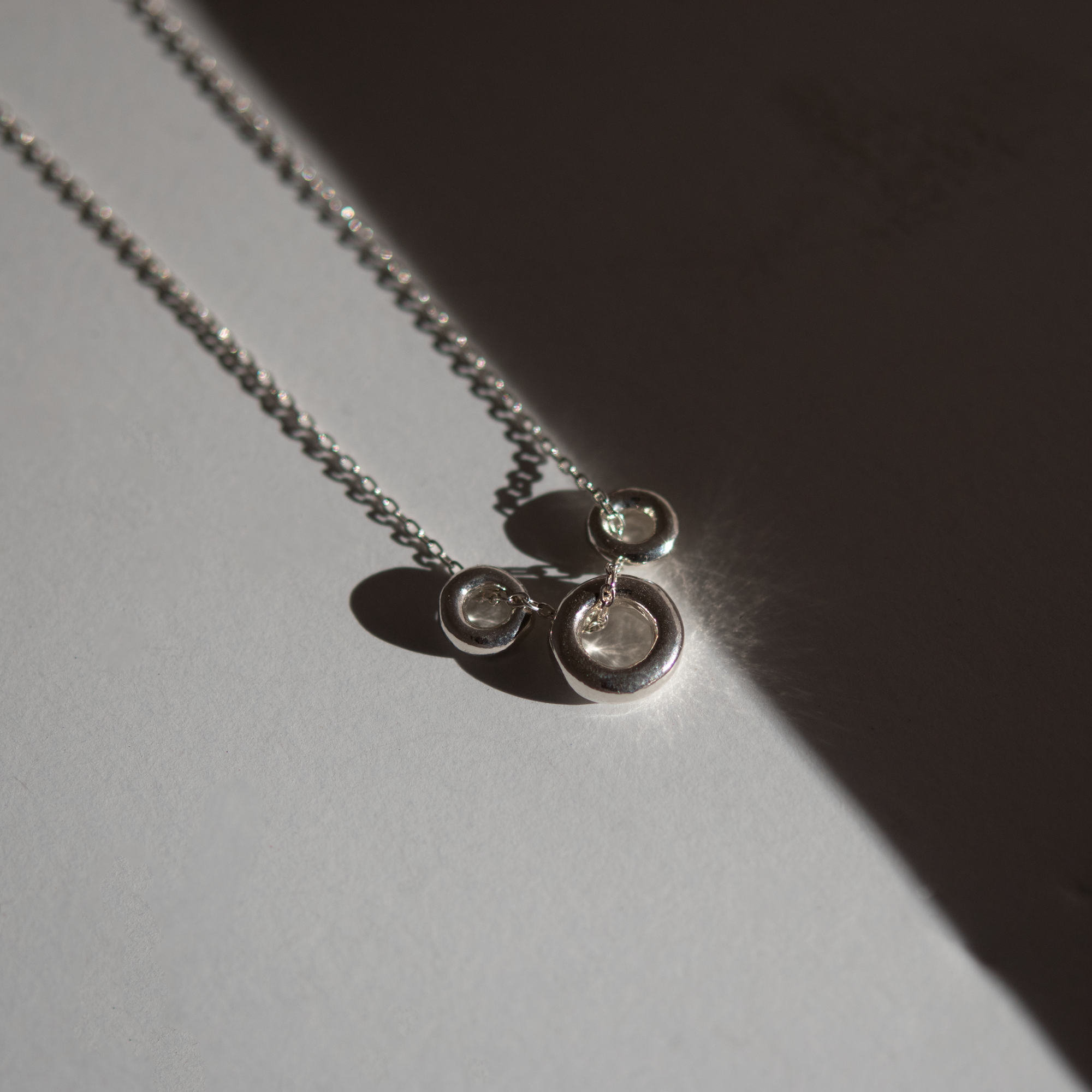 Triple Torus Charm Necklace