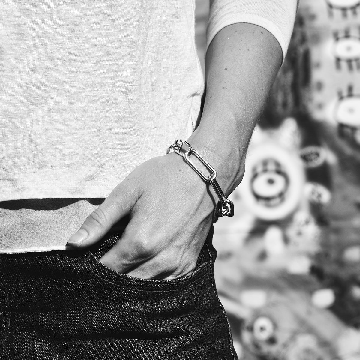 Eliza link bracelet on a model for scale. Elongated Sterling silver links and a handmade clasp lend an edgy, NYC vibe.