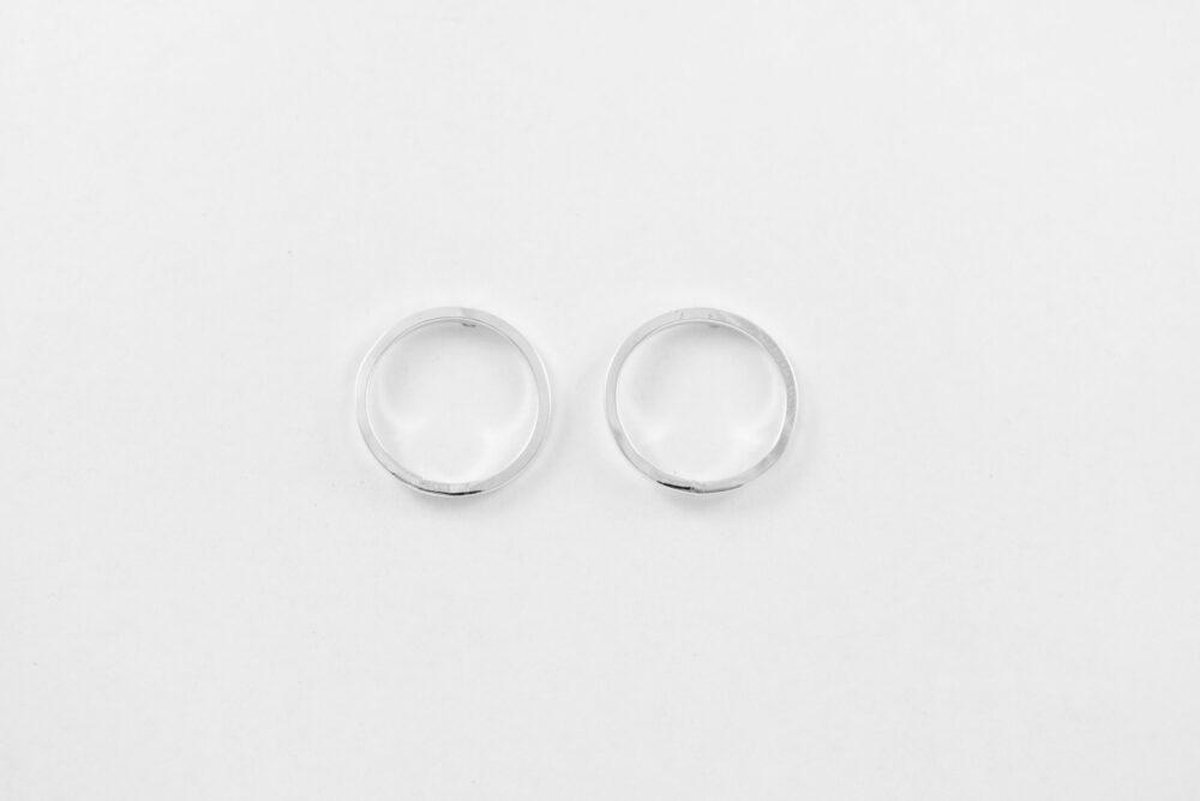 Flat lain photo of the small circle earrings. Simple wire circles on a post - an everyday favorite!