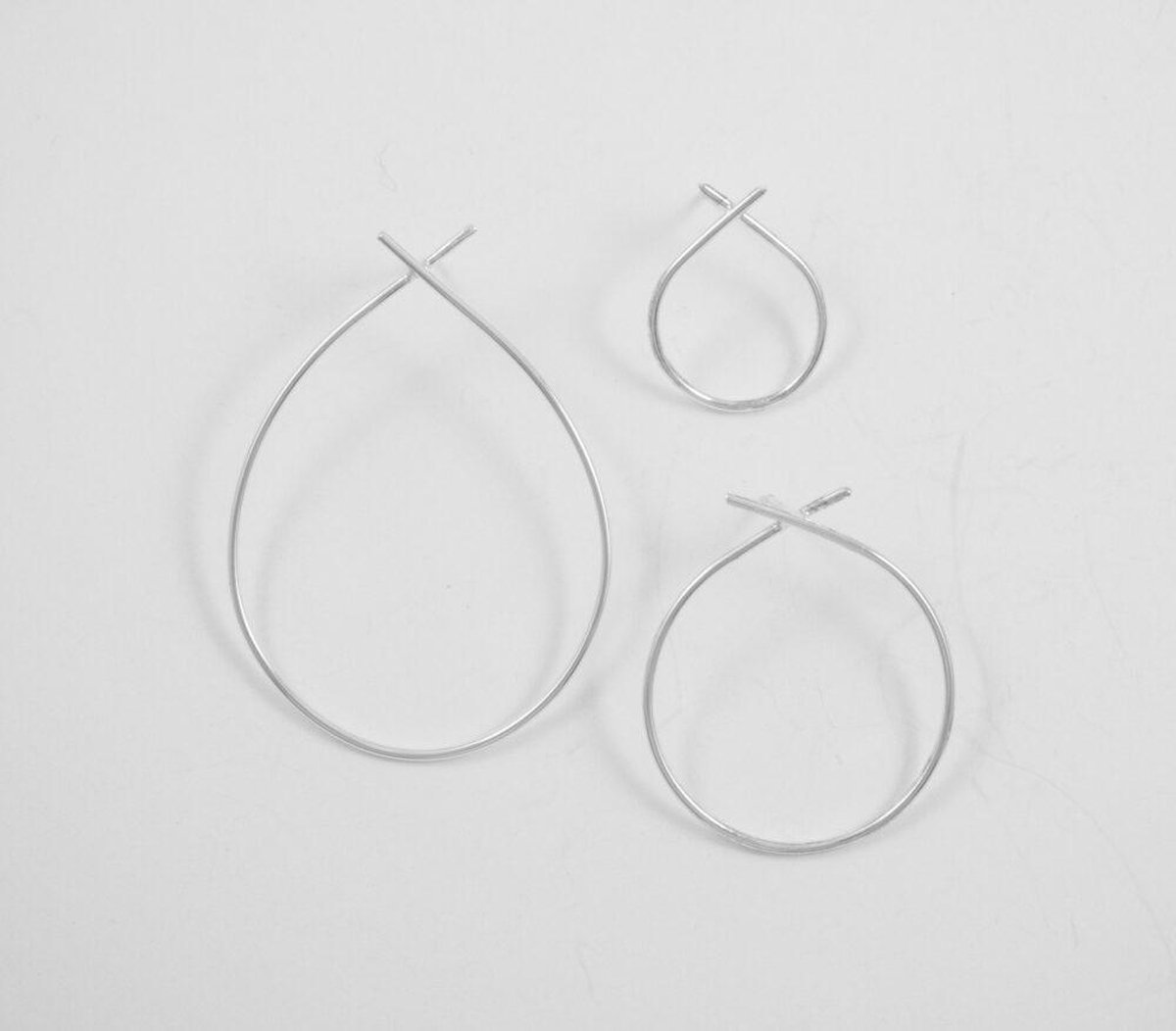 A relative size comparison of all three teardrop earrings: small, medium, and large.